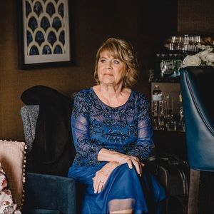 Blue Oleg Cassini mother of the bride gown